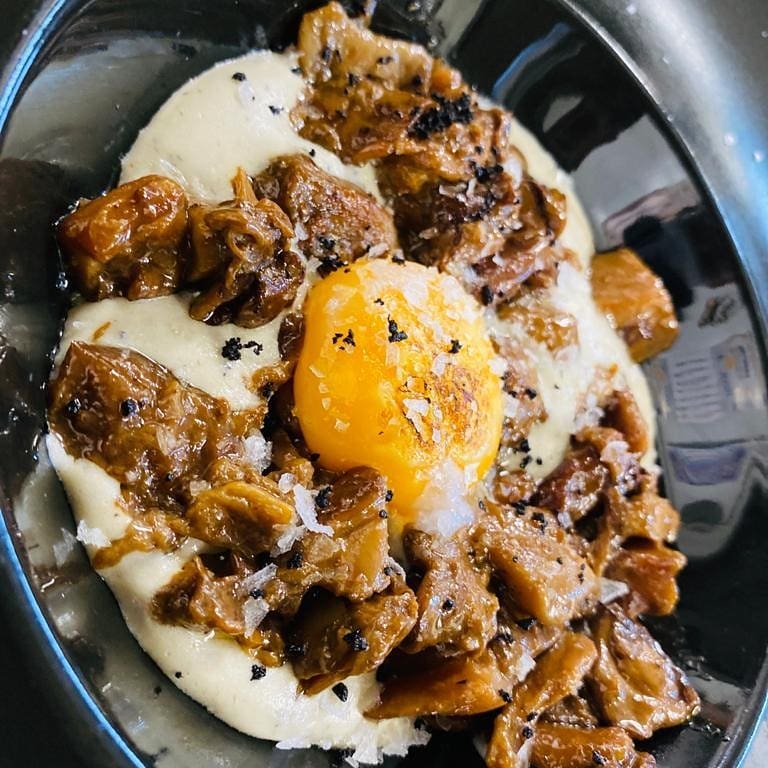 Huevo con champiñones